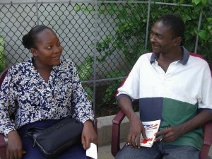 Frantzie and Heguel are shown sitting here. The picture was taken at the fourth annual Open Space Meeting on Open Space, at the Villa Ormiso in Bizoton, Haiti.