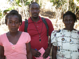 Michaël and Heleine with their case manager, Mahotière